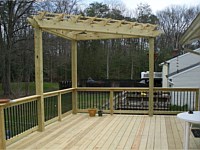 <b>Pressure Treated Wood Deck and Wood Railing with Round Black Aluminum Balusters-Corner Pressure Treated Pergola</b>